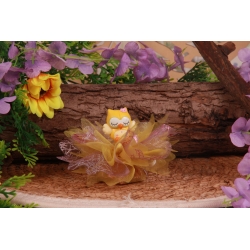 Chouette jaune sur tulle