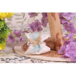 Papillon or sur pochon écru