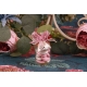 Papillon rose sur pot en verre