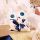 Fleur blanche sur pochon à pois bleu